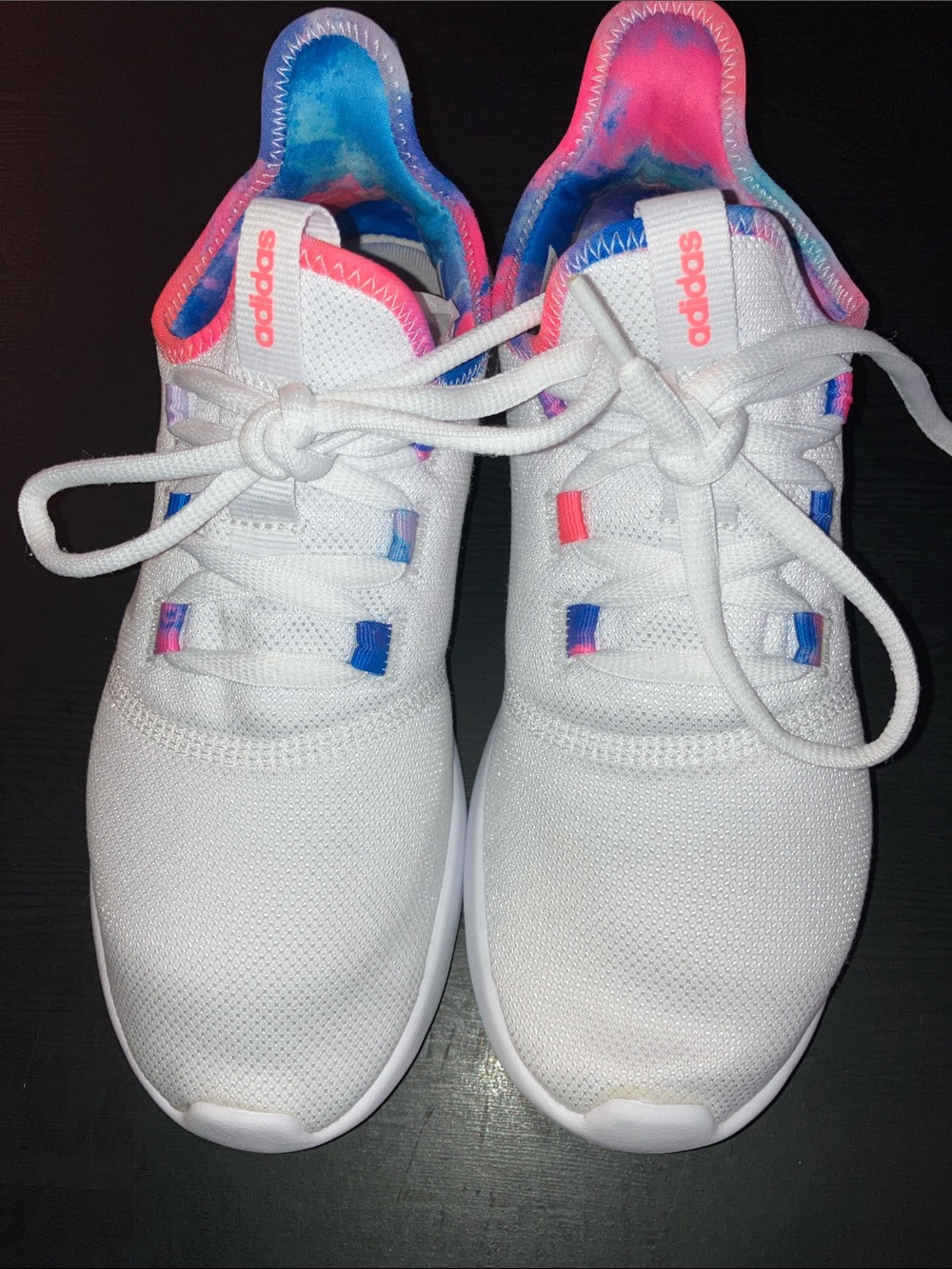 Woman’s cloudfoam Adidas with tie-dye accents
